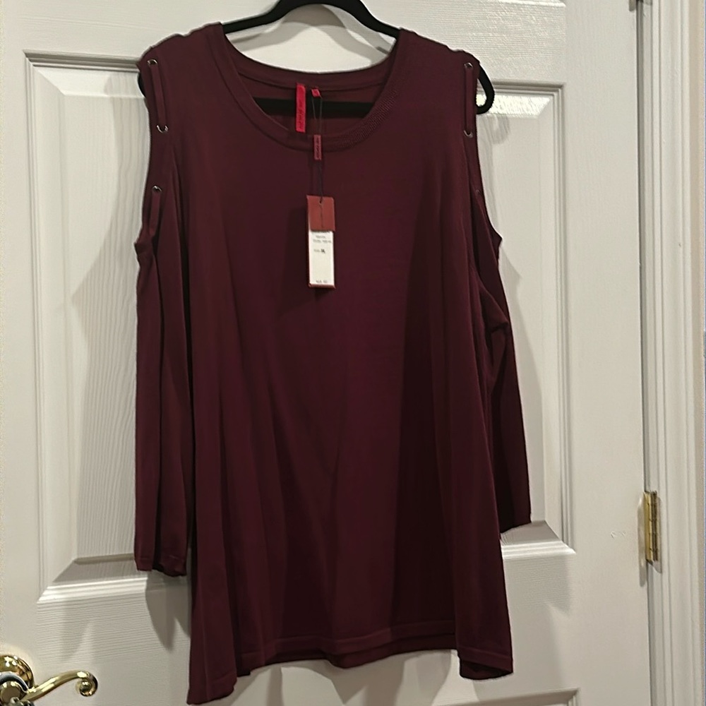 Ladies sweater.  Cold shoulder  with lace detail